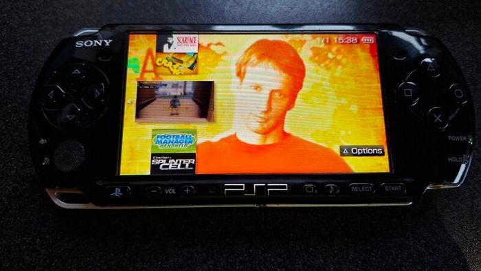 Modded Black PSP Slim 3000 128GB with games