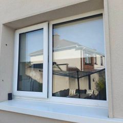 White uPVC Window and Roller Blind.