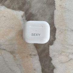 AirPods 3rd gen case and left AirPod
