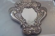 a sterling silver  mirror frame