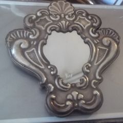 a sterling silver  mirror frame