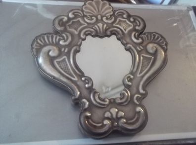 a sterling silver  mirror frame