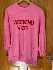Girl's/ Woman's Pink sweater with ripped design  Weekend Vibes