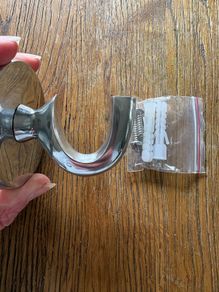 Large silver coloured hanging hook with screws and raw plugs