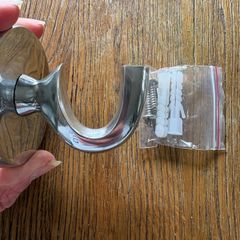 Large silver coloured hanging hook with screws and raw plugs