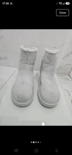Genuine UGG classic zip it mini boot