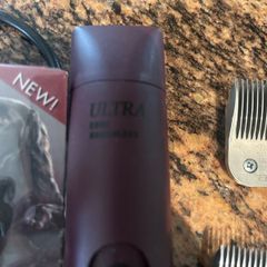 Andis Ultra dog clippers with blades . One blade brand new