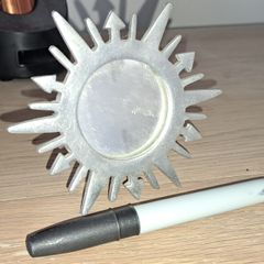 small silver sunburst mirror