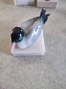 Royal Copenhagen figurine seagull on marble plinth.