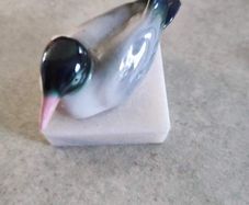 Royal Copenhagen figurine seagull on marble plinth.