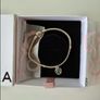 Brand new Pandora Moments Snake Chain Bracelet with green stone charm Image 4