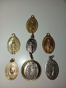 Small St Francis of Assisi religious medal with Italian blessing on the back plus other religious medals