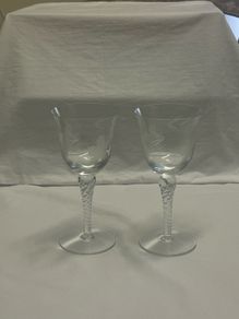 A pair of glasses with leaf and berry designs