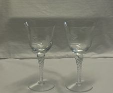 A pair of glasses with leaf and berry designs