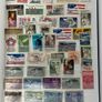 An Post Irish 16 Page Stamps Stock Book with used stamps from America to Cayman Islands Image 2