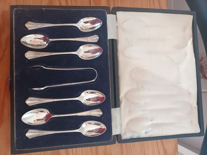 Set of 6 Tea Spoons and  matching Sugar Nips