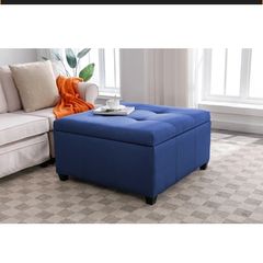Spacious upholstery ottoman storage , brand new in original box, in blue colour
