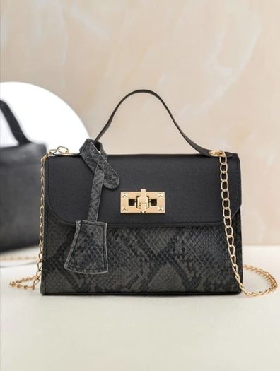 Black snakeskin twist lock bag