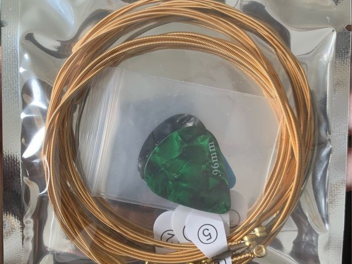 Brand New Guitar String and Picks