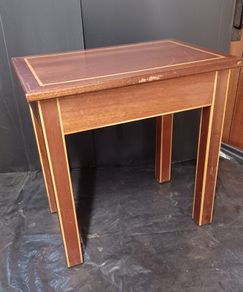 Wooden side table with storage compartment