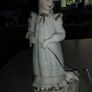Lovely musical lady figurine with baby lamb. Image 2
