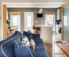 Navy Sofa & Yellow Armchair