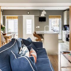 Navy Sofa & Yellow Armchair