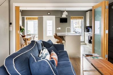 Navy Sofa & Yellow Armchair