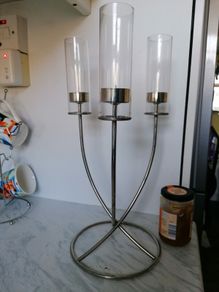 Beautiful silver toned triple flame candelabra, with 3 glass hurricane shades, and circular base
