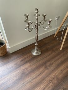 Very tall silver candle holder
