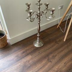 Very tall silver candle holder