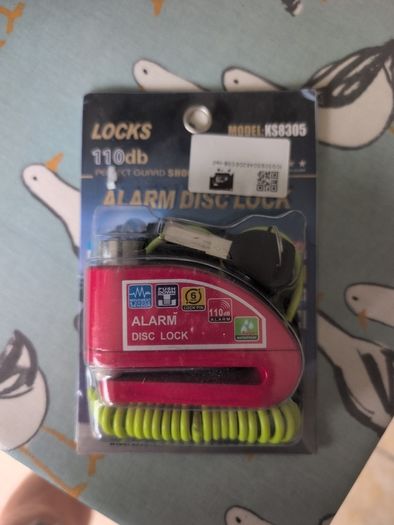 Alarmed disc lock
