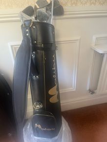 Golf bag plus clubs