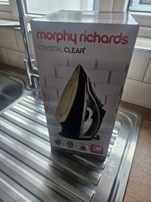 brand new in box iron