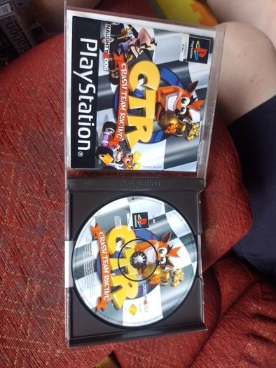 Crash Team Racing PS1 disk and booklet