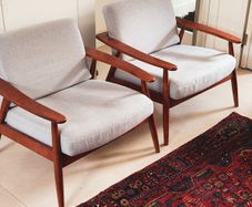 SLF24 Demure mid-century style armchairs