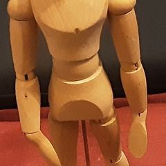 wooden artist figurine