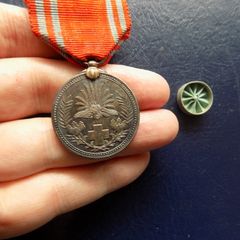 Japanese Red Cross Service Medal.Old dark tone.