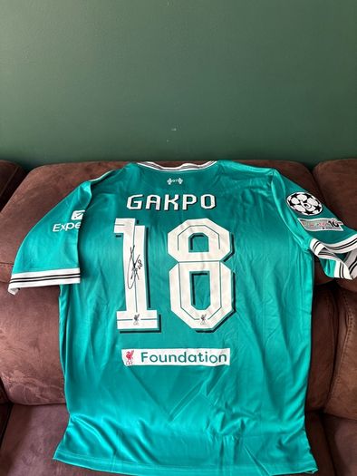Cody Gakpo signed Liverpool jersey