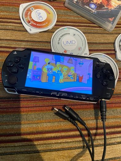 PSP  Console plus 10 games, charger and headphones