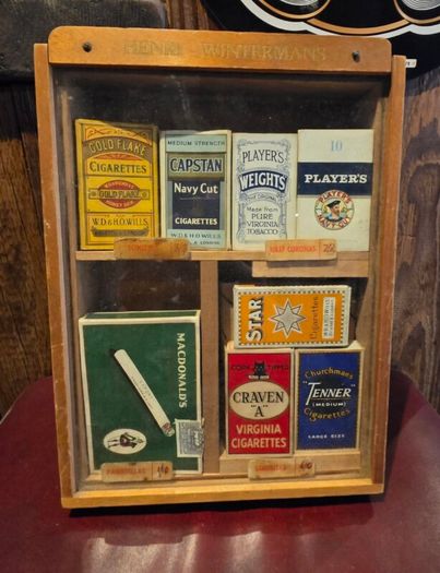 Old tabacco boxes and display case