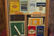 Old tabacco boxes and display case