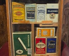 Old tabacco boxes and display case