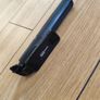 black extendable selfie stick and mini-tripod featuring a detachable wireless Bluetooth remote. Image 3