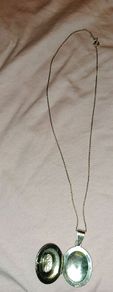 Sterling silver locket pendant on chain