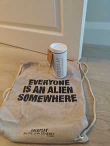 Coldplay concert merch (everyone is an alien somewhere)