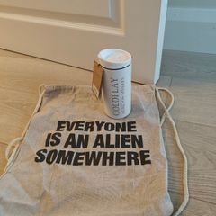 Coldplay concert merch (everyone is an alien somewhere)
