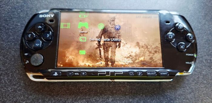 Modded Black PSP Slim 3000 128GB with games