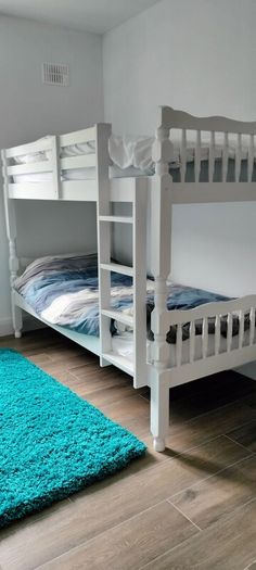 single wooden bunk bed. White