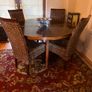 Walnut veneer dining table and four rattan dining chairs Image 3